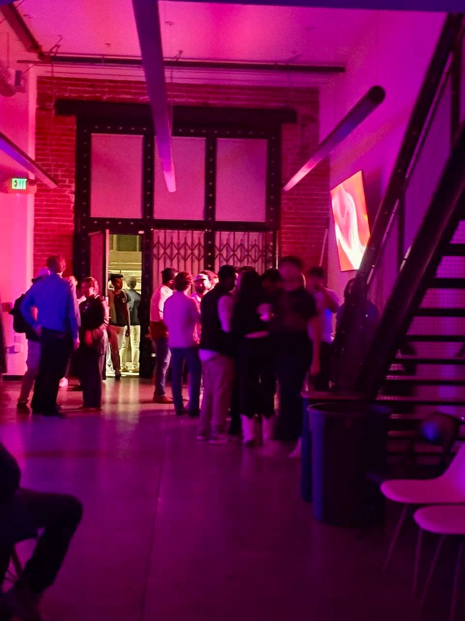 An evening event: guests by the gate door